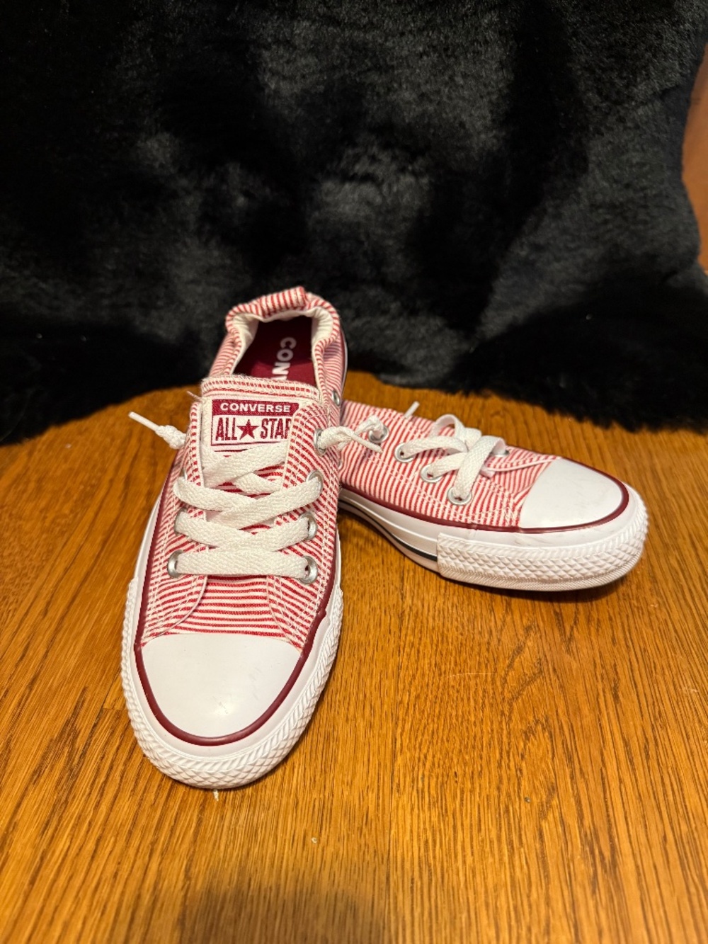 Converse all star red and white striped tennis shoes